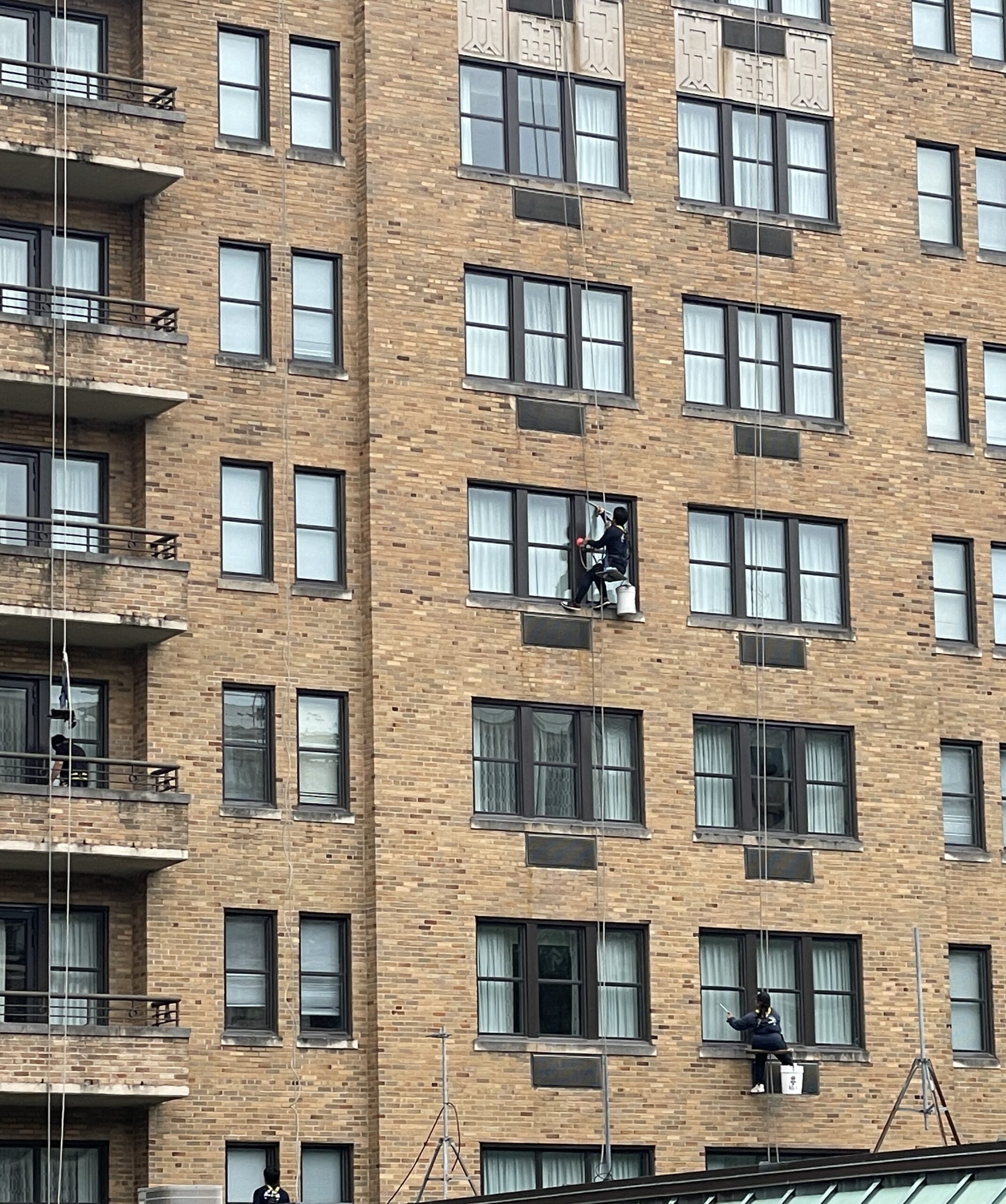 Exterior cleaning of a commercial building facade