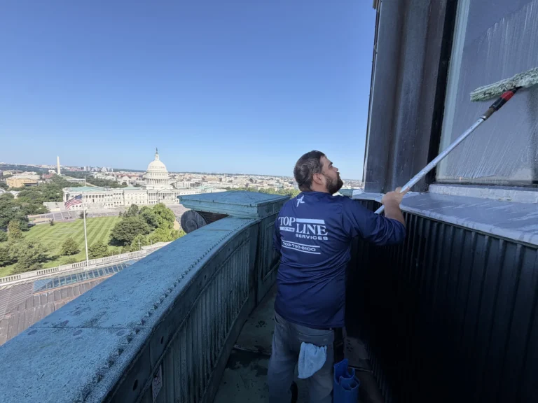 Top of the Line commercial window cleaner with the U.S. Capitol in the background in Washington, DC